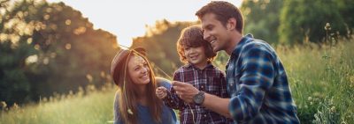 family playing in field