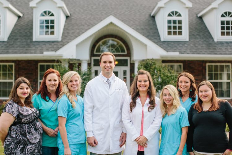 The Farmington Dental & Orthodontics team including Dr. Trogdon, Dr. Stroope & dental hygienists