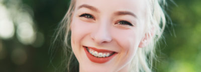 smiling girl with braces